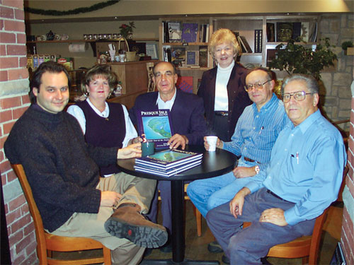 Matthew D Walker at book signing for The Presque Isle Book with several well-known Erie Artists